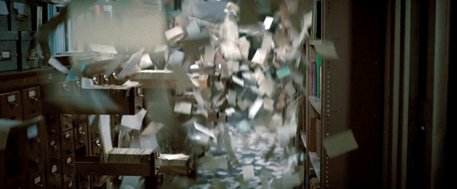Animated gif of library index cards flying out of their drawers.