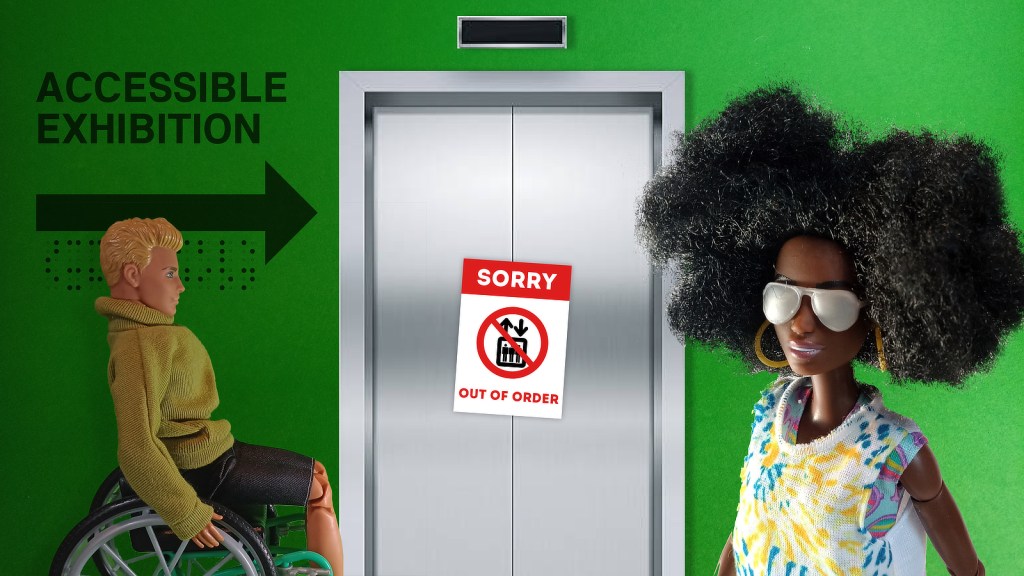 Two Barbies, one in a wheelchair and one of them visually impaired, next to a sign that says "Accessible Exhibition" and a lift with a sign on it that says "SORRY, OUT OF ORDER".