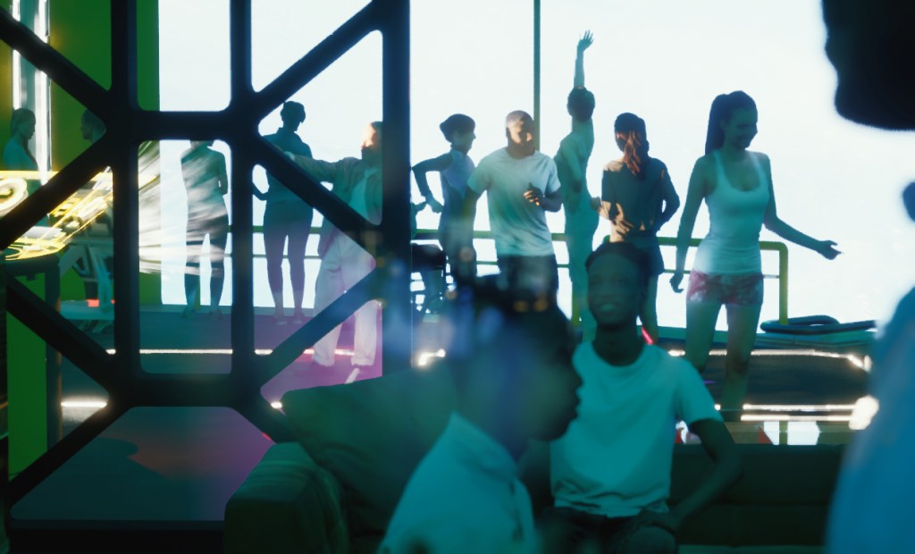 Teal and yellow, 1980s style disco with bright flashing lights and people dancing.